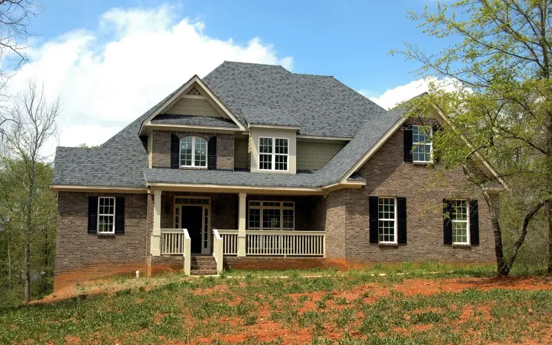Brick two-story home with a new architectural shingle roof