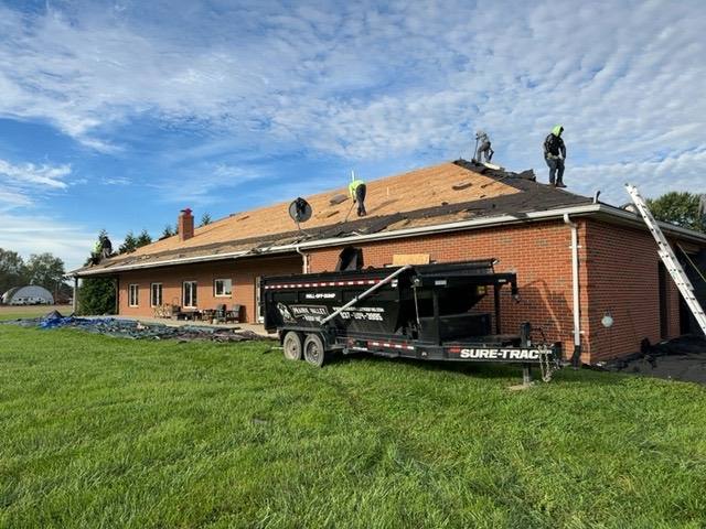 Architectural shingle installation beginning on freshly prepped decking with ice-and-water underlayment in place in Tipp City