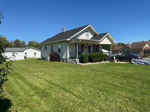Gutter Repair in Sidney — Architectural asphalt shingles; 5" seamless gutter (16-foot run on shed)
