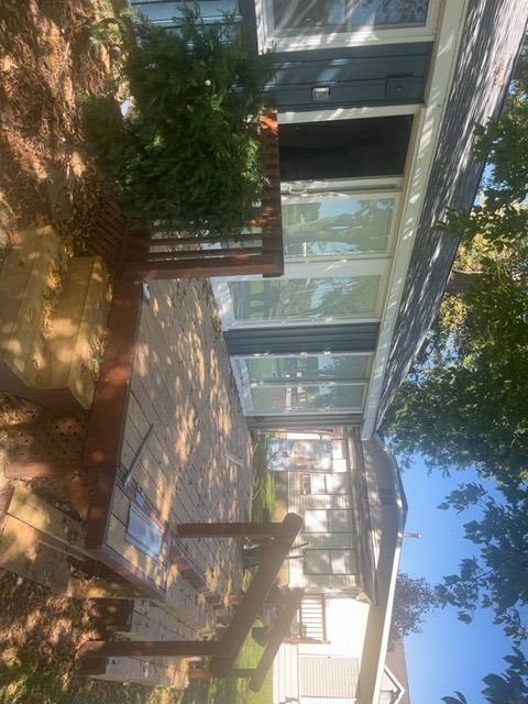 Close-up of finished vinyl board and batten siding on the home's wall in Lakeview